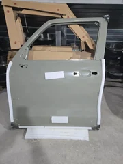 6101100XKM01A Дверь передняя левая Tank 300 JMC